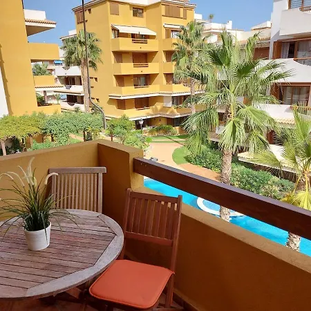 En Punta Prima Con 3 Piscinas, 2 Dormitorios,2 Banos ,parking Y Seguridad 24