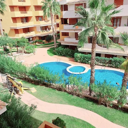 Apartment En Punta Prima Con 3 Piscinas, 2 Dormitorios,2 Banos ,parking Y Seguridad 24 *